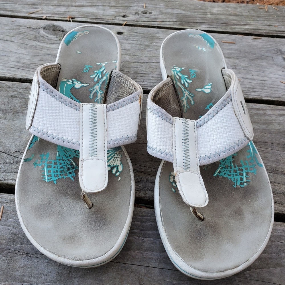 white leather thong sandal with teal stitching